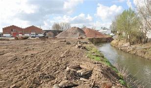 Remediation strategies, methods and financial models for decontamination and reuse of land in urban and rural areas